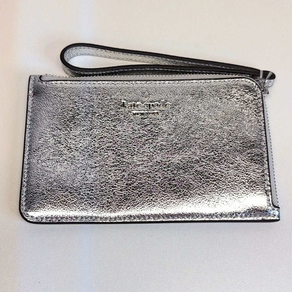 Kate Spade Lucy Small Silver Zip Around Wristlet Retail $99